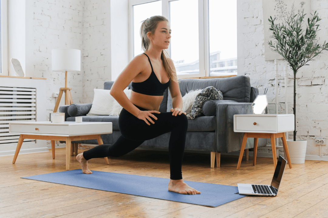 A woman following a Move8 exercise programme at home